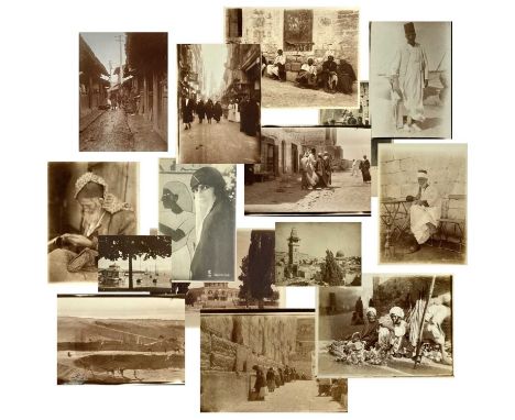 A collection of early 20th century photographs of Jerusalem and Luxor. Over thirty b+w photographs, depicting life in Jerusal