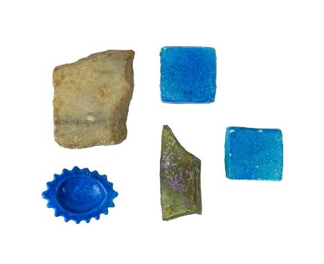 Three Persian blue pottery mosque tiles, Qum, Iran. With paper label inscribed 'Unique to mosque at Qum, Iran, given to me in