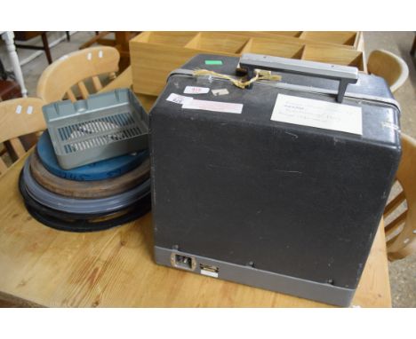 CASED BELL &amp; HOWELL 16MM FILM PROJECTOR AND REELS ETC