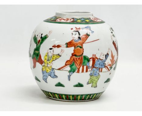 A Late 19th Century Chinese famille verte ginger jar. Kangxi 4 character mark. 15x17cm. 
