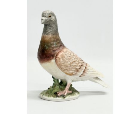 A West German pigeon figurine by Goebel Pottery. 14x15cm. 