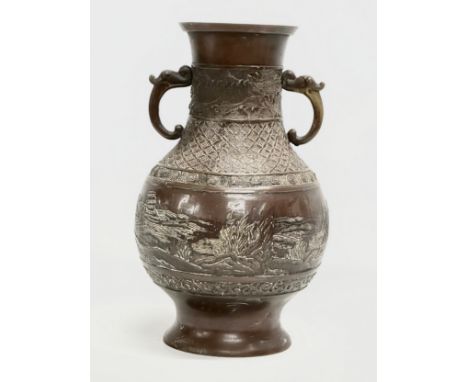 A Late 19th Century Japanese bronze vase. Meiji Period. Circa 1880-1900. 18x30cm 
