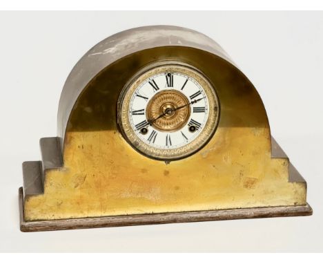 A Late 19th Century brass mantle clock by Ansonia Clock Co. With pendulum. 44x15x27cm 