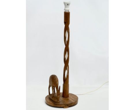 A large Mid Century African style table lamp. 26x76cm 