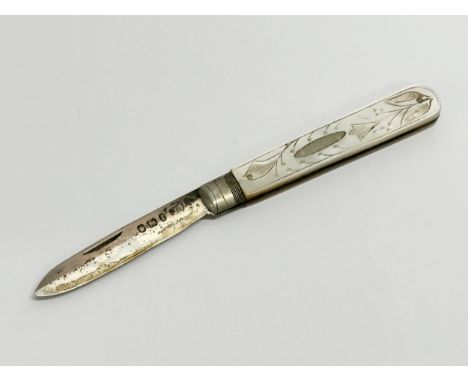 A Late 19th Century silver and mother of pearl fruit knife. Stamped J&amp;R. Sheffield, 1897. 