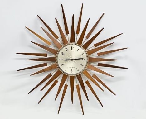A 1960’s Seth Thomas Mid Century teak sunburst clock. 66cm 