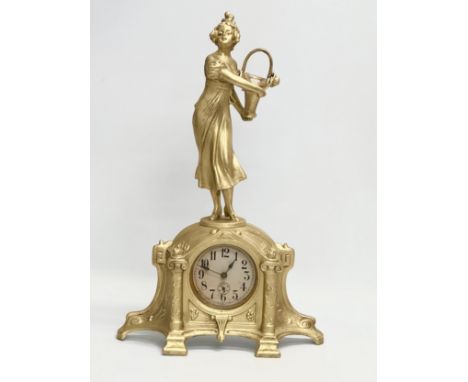 A large Early 20th Century German painted spelter mantle clock. 29x47cm 