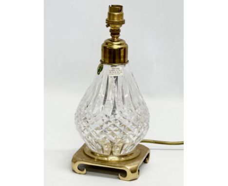 A Waterford Crystal table lamp with brass base. 12x12x28cm 