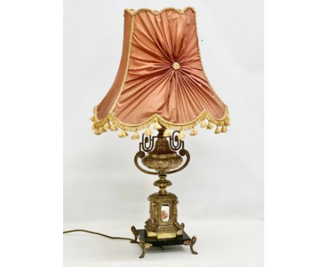 A large Mid 20th Century French Empire style brass table lamp on slate base. Raised on 4 brass feet. 89cm 
