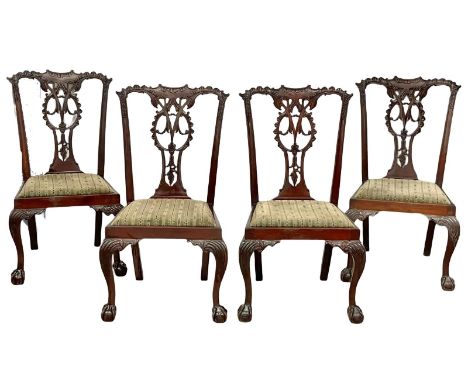 A set of 4 vintage Chippendale Revival mahogany chairs on Ball &amp; Claw feet. Circa 1930-1950. 