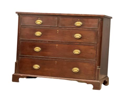 A George IV mahogany chest of drawers with Doric columns and brass drop handles. Raised on bracket feet, circa 1820-30.  111c
