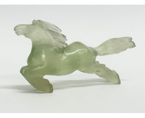 A Chinese green jade horse sculpture. 9cm 