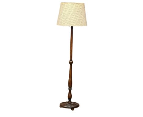 A vintage oak standard lamp. 173cm. (1) 