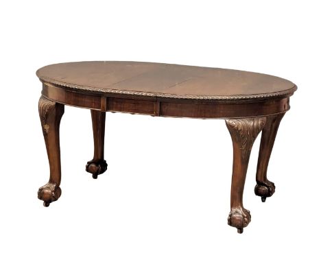An Early 20th Century Chippendale Revival mahogany dining table. 150x107x76cm 