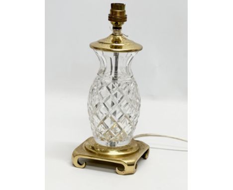 A Waterford Crystal ‘Clare’ table lamp with brass base. 12x12x29cm 