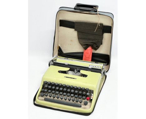 A 1956 Olivetti Lettera 22 typewriter with case. 