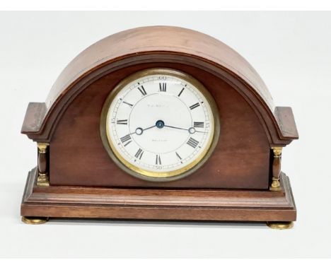 An S.D. Neill mahogany cased mantle clock. Swiss works. Early 20th Century. Circa 1900-1910. 23x9x15.5cm 