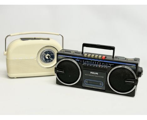 2 vintage radios. A Philips TR0885 Stereo Radio Cassette Recorder. A Bush Classic radio. 