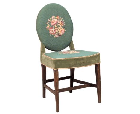 An Early 20th Century mahogany hall chair with tapestry and needlepoint. 
