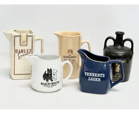 A collection of water jugs. Tennents Lager by Wade. Black &amp; White Scotch Whisky by Hancock Corfield &amp; Waller. Etc 