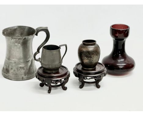 A job lot. A Late 19th Century Hyacinth vase. A large Victorian pewter tankard and other. A pair of Early 20th Century orient