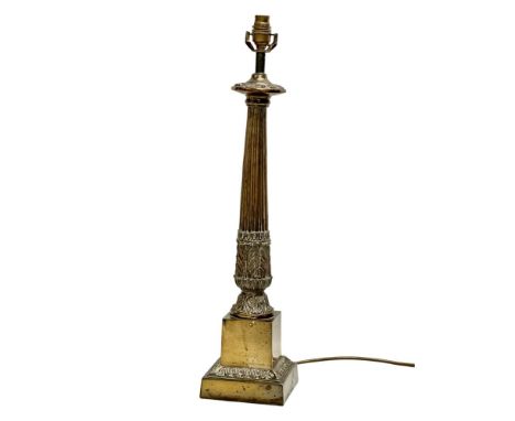 A large Mid 20th Century brass table lamp with reeded column. 64cm 