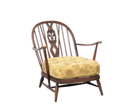 An Ercol Fleur De Lys Mid Century armchair. 