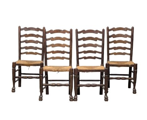 A set for 4 Early 20th Century oak and beech ladder back chairs with rush seats in the 17th Century style. 