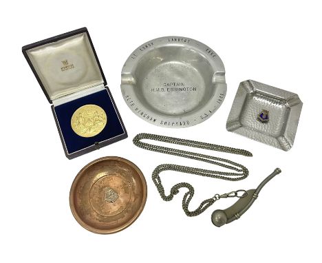 1950s gilt metal medallion, decorated in relief with the Coat of Arms of Oostende to one side and engraved HMS Humber togethe