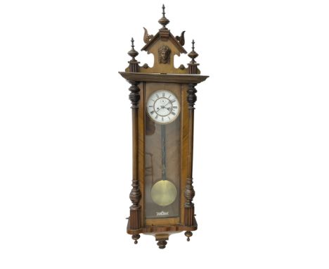 German - late 19th century walnut and ebony twin train weight driven Vienna regulator, with a fully glazed door, shaped pedim