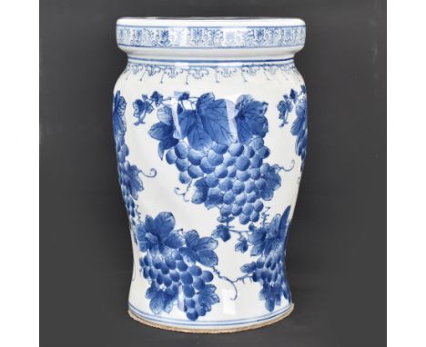 20th century Oriental ceramic garden seat of barrel shape, decorated with grape vines, H40cm