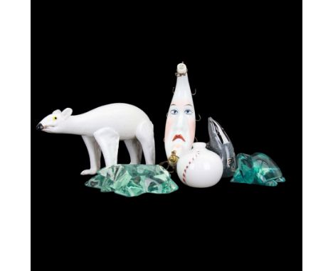 Milk glass decanter, modelled as a moon with a painted face, together with glass animals modelled as a polar bear, turtle and