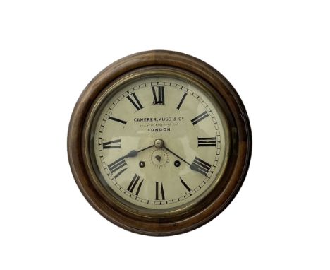 Camerer Kuss & Co -  8-day wall clock with alarm, mahogany dial surround and brass bezel, 8" painted dial with Roman numerals