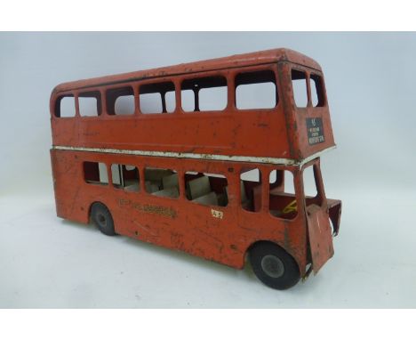 A large Tri-ang tinplate model of a London bus.