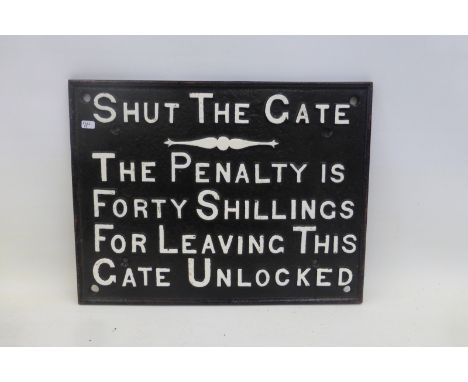 A cast iron railway sign - "Shut the Gate", 16 1/2 x 12 1/2".