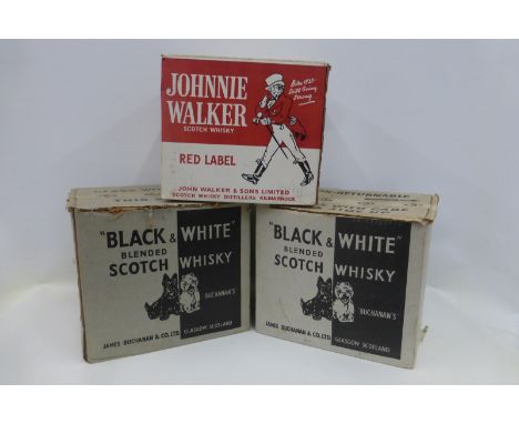 Two "Black & White" blended Scotch Whisky original cardboard delivery boxes and another for Johnnie Walker Red Label.