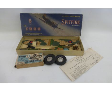 A boxed Frog Spitfire Flying Model and a boxed set of Frog Aero wheels.