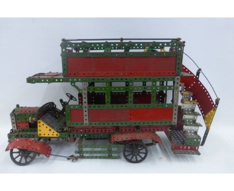 A large Meccano clockwork model of a London double decker bus.
