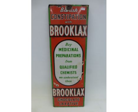 A Brooklax Chocolate Laxative rectangular enamel sign, 7 1/2 x 22 1/2".