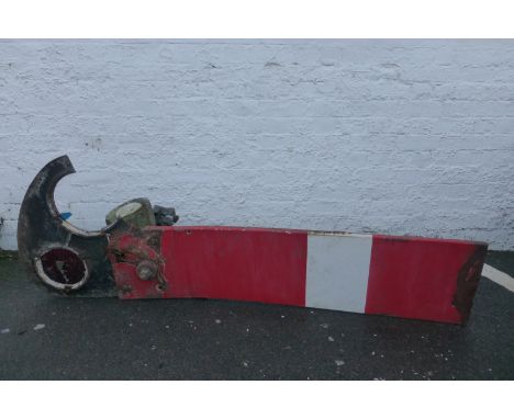 A railway enamel signal on original cast iron end with glass panels.