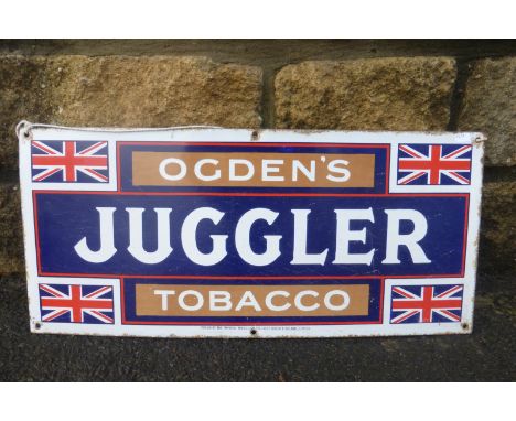 An Ogden's Juggler Tobacco rectangular enamel sign in good condition, 22 x 10".