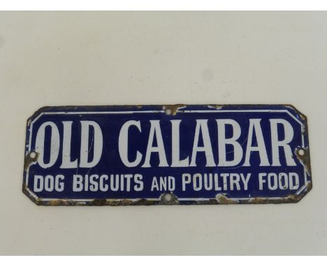 A small Old Calabar Dog Biscuits and Poultry Food enamel sign, possibly from a drawer front, 7 x 2 1/2".