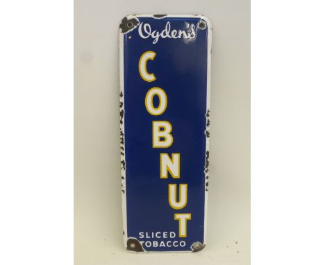 An Ogden's Cobnut Sliced Tobacco enamel finger plate, 3 1/4 x 9".