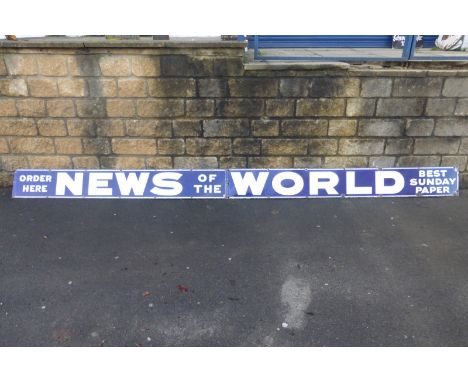 A two piece News of the World blue and white narrow enamel sign with good gloss, 149 1/2 x 10 1/4".