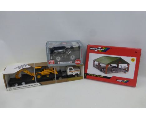 Three assorted die-cast farm models: an Ertl 5570 JD Construction Equipment Hauling Set, a Siku 4484 JCB 8250 Tractor 2009 an