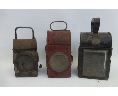 A small handheld lamp bearing plaque for J. Cowdy, another for Davey & Co. London and a third.