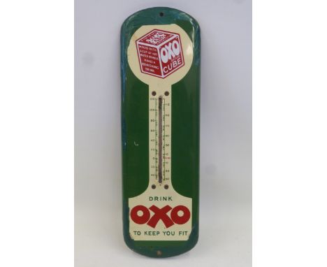 A rare Oxo enamel thermometer with pictorial cube design, some amateur retouching to the edges, 5 1/2 x 18".