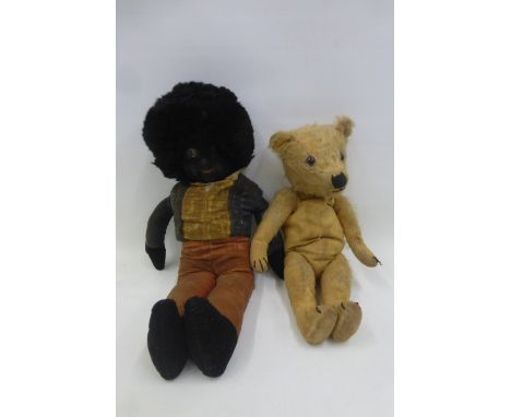 An early straw filled teddy bear and an early 20th Century Golly, possibly Chad Valley.