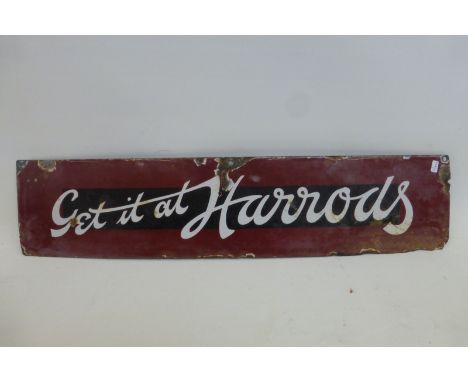 A "Get it at Harrods" rectangular enamel sign, 26 3/4 x 6".