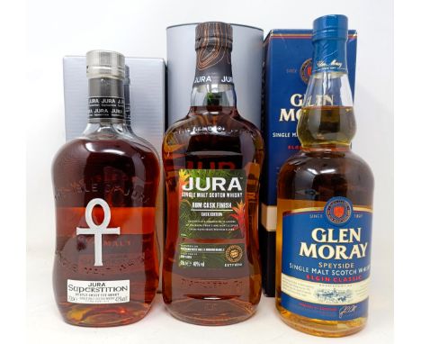 A bottle of Glen Moray single malt Scotch whisky, a bottle of Jura single malt whisky, and Jura Superstition, all boxed (3) 